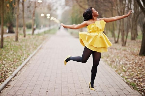 Happy Woman Twirling in the Air